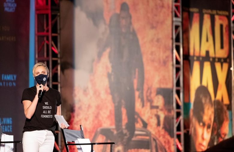 Cast member Charlize Theron attends a screening of "Mad Max: Fury Road" to benefit the Charlize Theron Africa Outreach Project at a rooftop drive-in in Los Angeles, California, July 31. REUTERS/Mario Anzuoni